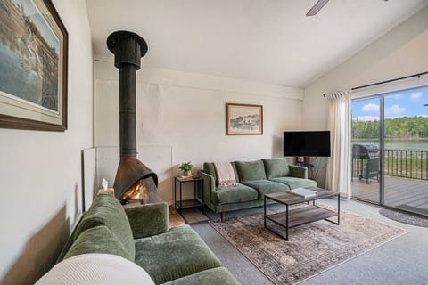 Unwind on new, comfortable chenille couches after a fun day on the lake. 