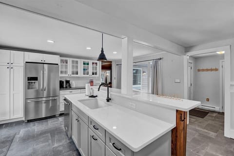 Spacious Kitchen Island with Modern Lighting