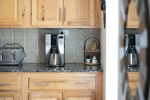 Fully equipped kitchen with modern appliances.