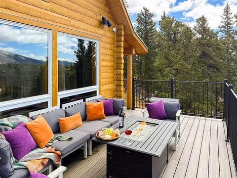 Sit down and take it all in by the fire table.