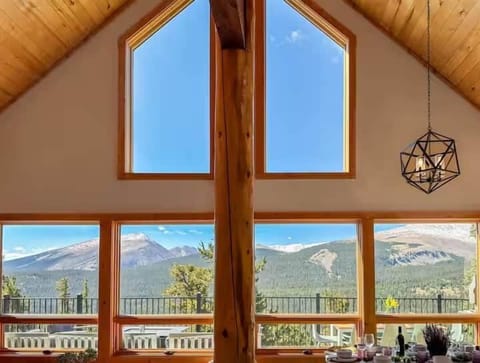 With floor to ceiling mountain views!