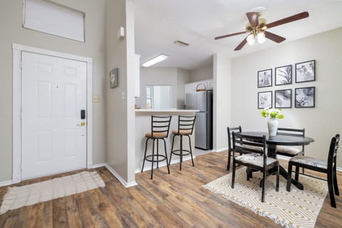 Dining room seats four at the table and two at the bar