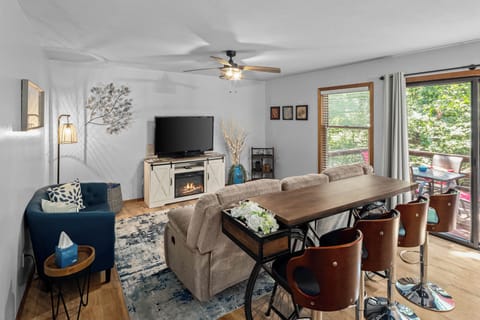 Living room with smart TV for streaming from your own accounts!