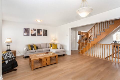 Living Room with Kitchen & Dining Room on far right.