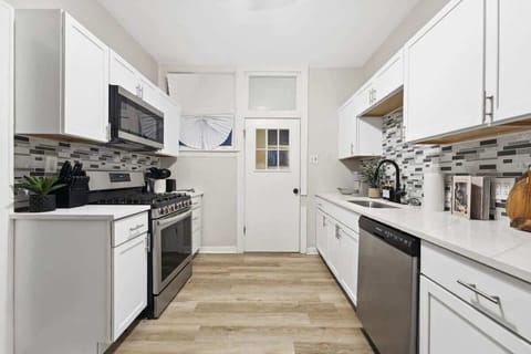 Fully stocked kitchen with everything you need to cook or reheat takeout from local spots!