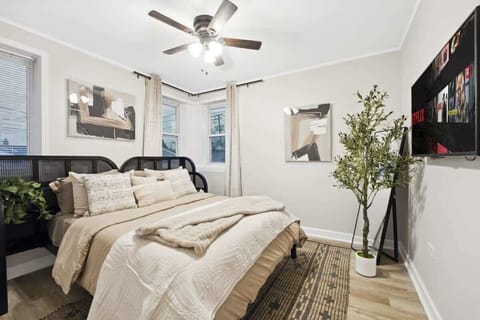 Peaceful retreat with warm tones and plush pillows.