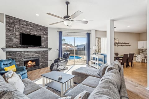 Large comfortable living room with views of the pool