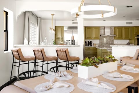 The open floor plan seamlessly connects the kitchen and dining area, making it easy to enjoy meals, conversation, and memories—all in one space.