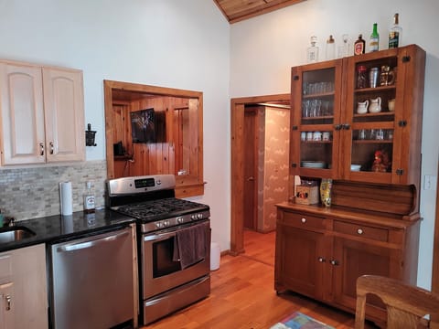 KITCHEN:  The home has a very large kitchen with all appliances including a dishwasher as well as a dining area that seats 4 adults.