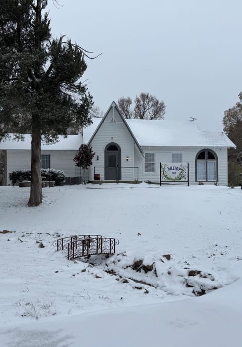 Photo of property with snow