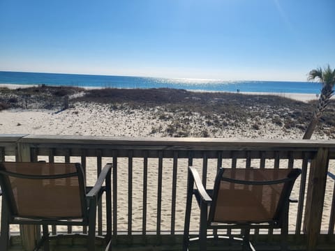 Back deck over looking sand area and Gulf 