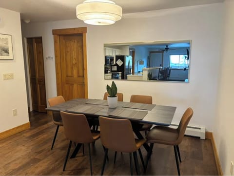 Large table seats 6-8 guests.  Move bench from the living room for more seating.