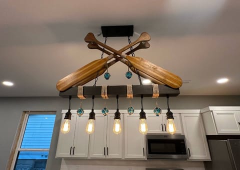 Custom light fixture in the new build house. We are bringing you along the journey as this house is being built.