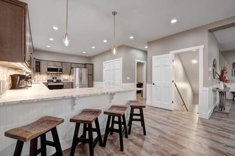 Full kitchen with stainless steel appliances