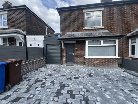 Parking for 2 cars and access to secure compact garage