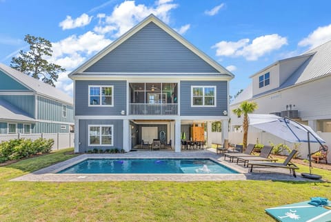 Welcome to Three Palms, relax by the pool or play a friendly game of corn-hole.