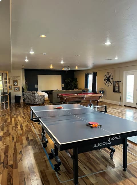 Family room w/ping pong and pool tables