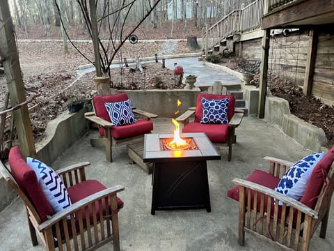 The gas fire pit is a great wind down place. A swing and hammock is for you too!