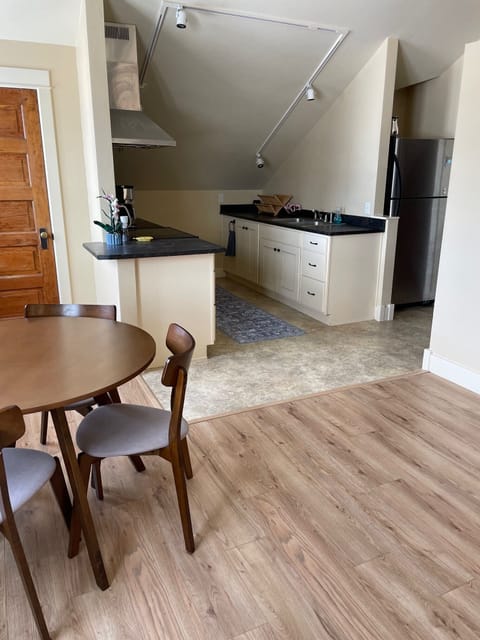 Second kitchen and eating area upstairs.