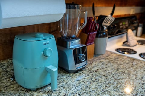 Cozy cabin kitchen with modern appliances