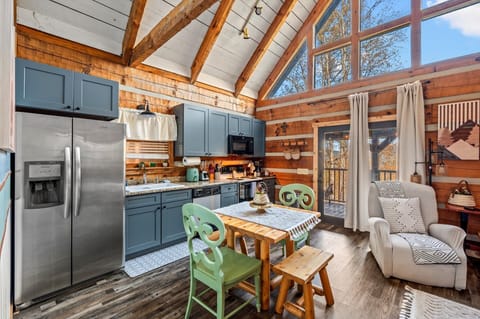 A cozy dining area perfect for enjoying a meal while soaking in the cabin warmth