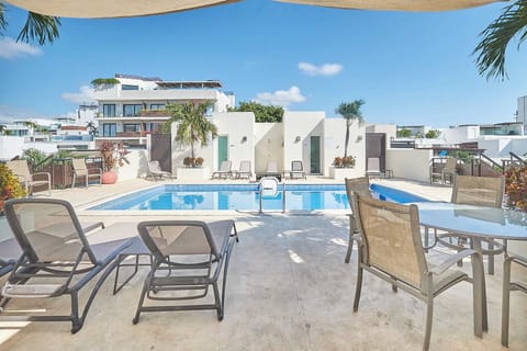 Poolside paradise awaits. Relax and soak up the sun.