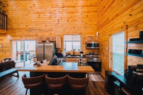 The island comes with seating for 6 just steps from the fully-loaded coffee bar.