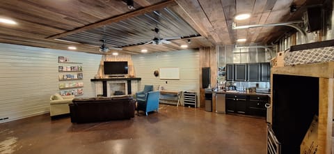 Rec room in main house. Dart board, ring toss game, Game closet with many games.