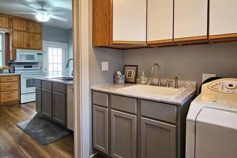 Laundry area: opens to kitchen