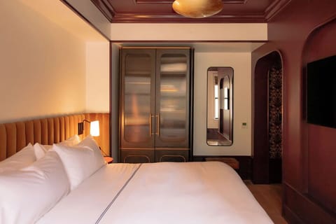 Settle in with spacious storage and a relaxing in-room TV.