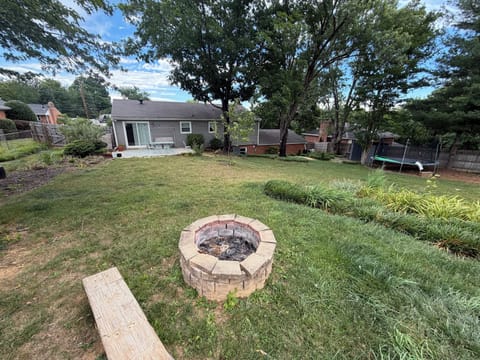 Our beautiful fenced in backyard. Fire pit ready!