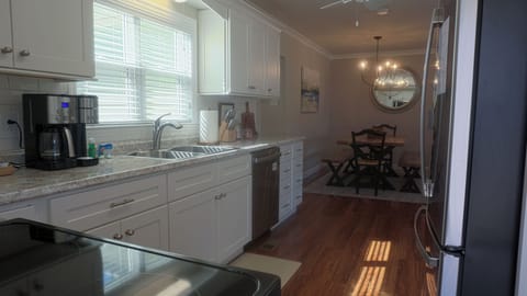 View from side entry towards the eat in kitchen. 