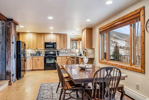 Kitchen: Drip coffee maker, Crockpot, toaster, cooking utensils, tableware