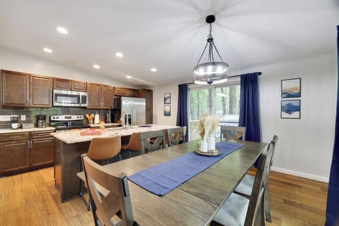 Dining table has seating for 6.