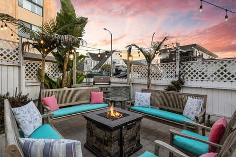 Backyard with outdoor seating, fire pit and BBQ