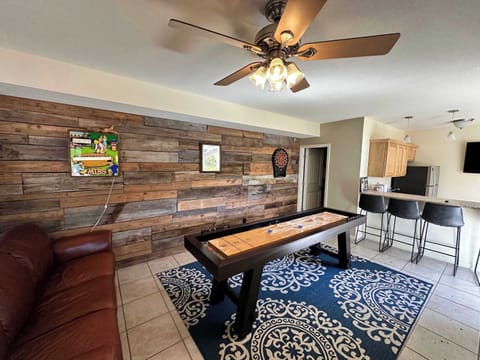 Enjoy hours of fun in the lowest-level game room, complete with a shuffleboard table!