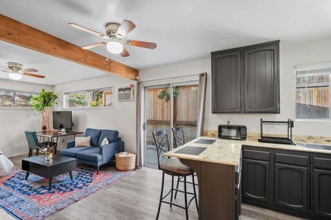 Unwind in the cozy living room with a dedicated workspace.