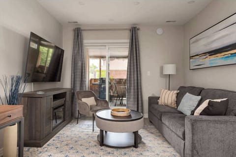 Comfortable Living Room with direct Patio Access and Cable TV