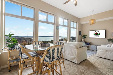 Sunroom with Extra Seating and Cable TV and a Stunning Lake View