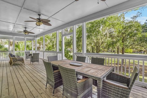 Enjoy tranquility on the full wrap around porch