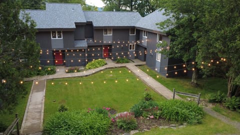 End unit condo with nice bistro lights to light up the courtyard and parking area