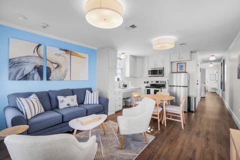 Open concept living room, kitchen and dining area