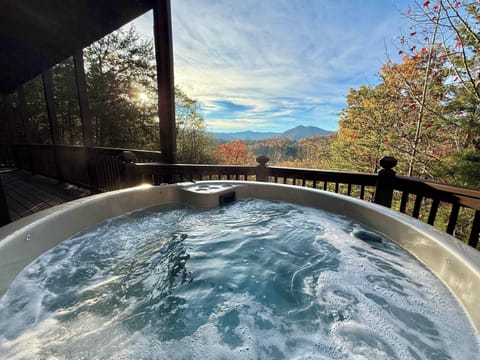 Relax in the hot tub with a Mountain View
