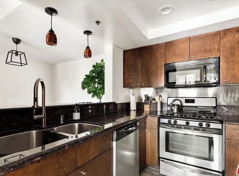 Stocked Chef's Kitchen with Nespresso Vertuo machine & pods, plus Ninja blender.