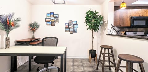 Workspace w/a Herman Miller Sayl chair & standing desk converter. 