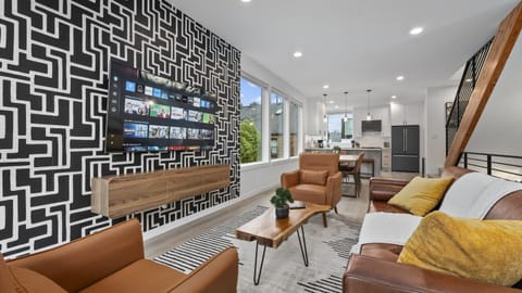 Modern living area with Smart TV and leather seating