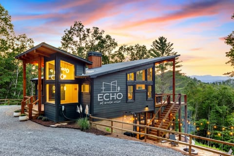 Architectural gem with modern lines, expansive windows, and wood accents. Stunning views and sleek design make this cabin the perfect retreat for design lovers seeking luxury and tranquility.