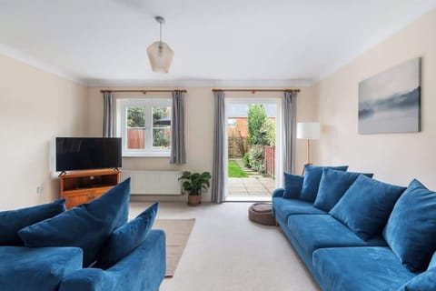 Spacious cosy living room with 2 large sofa beds and foot poofs for comfort.
16 " Smart TV. 


