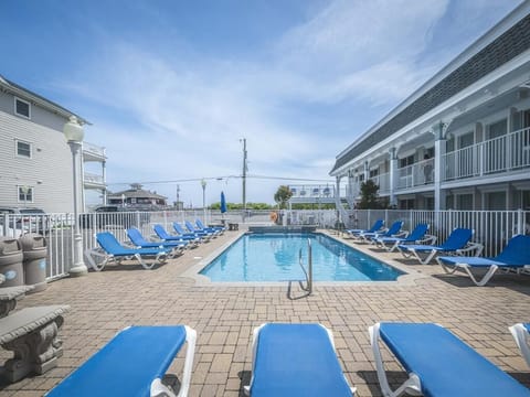 Take a dip in the community’s heated pool, surrounded by lounge chairs and umbrellas for sunny relaxation.
