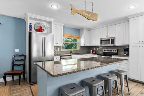 Sand Castle kitchen with Island and breakfast bar in the foreground